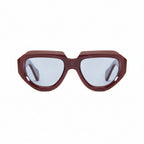 Sunglasses with a maroon frame and reflective lenses on a white background
